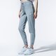 Moteriškos kelnės NIKE KELNĖS SPORTSWEAR ESSENTIAL bv4099-063 spalva pilka