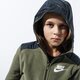Vaikiškas džemperis NIKE DŽEMPERIS UŽSEGAMAS SU GOBTUVU   B NSW HOODIE FZ WINTER bv4506-222 spalva žalia