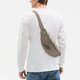 Moteriška liemens rankinė NIKE LIEMENS RANKINĖ HERITAGE HIP BAG db0490-351 spalva rusvai žalsva