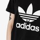 Moteriški marškinėliai ADIDAS MARŠKINĖLIAI SS TREFOIL TEE ADICOLOR cv9888 spalva juoda