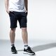 Vyriški šortai CHAMPION ŠORTAI LOGO SHORTS 215497bs501 spalva tamsiai mėlyna