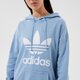 Moteriškas džemperis ADIDAS DŽEMPERIS SU GOBTUVU TRF HOODIE h33585 spalva mėlyna