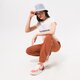 Moteriški marškinėliai NEW BALANCE MARŠKINĖLIAI NB   ESSENTIALS STACKED LOGO TEE wt91546mlt spalva balta