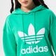 Moteriškas džemperis ADIDAS DŽEMPERIS SU GOBTUVU TRF HOODIE he6954 spalva žalia