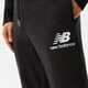 Vyriškos kelnės NEW BALANCE KELNĖS NB ESSENTIALS STACKED LOGO SWEATPANT mp03558bk spalva juoda