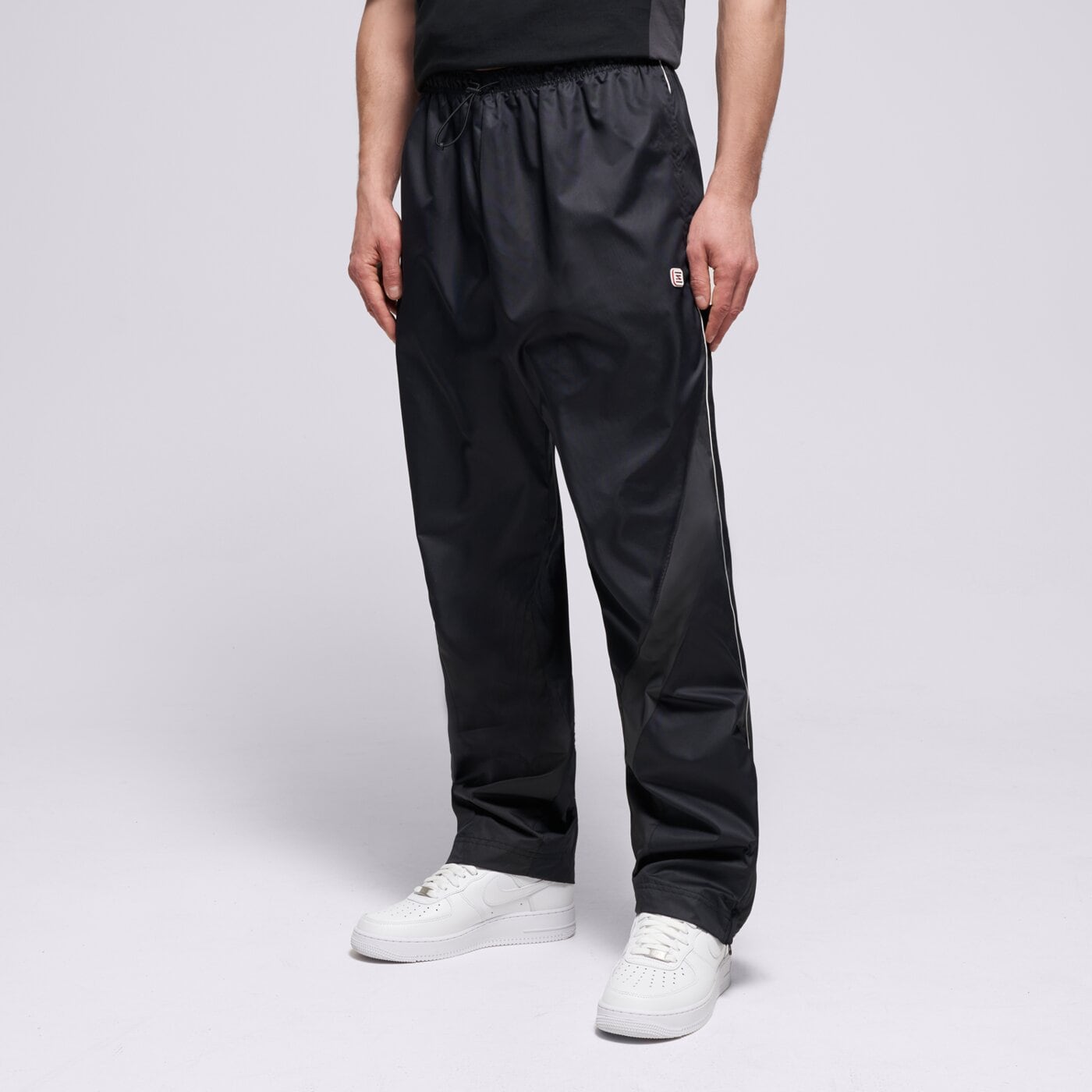 NIKE KELNĖS M NSW WVN PANT SHOX IH0653-010 JUODA 54,00 EUR